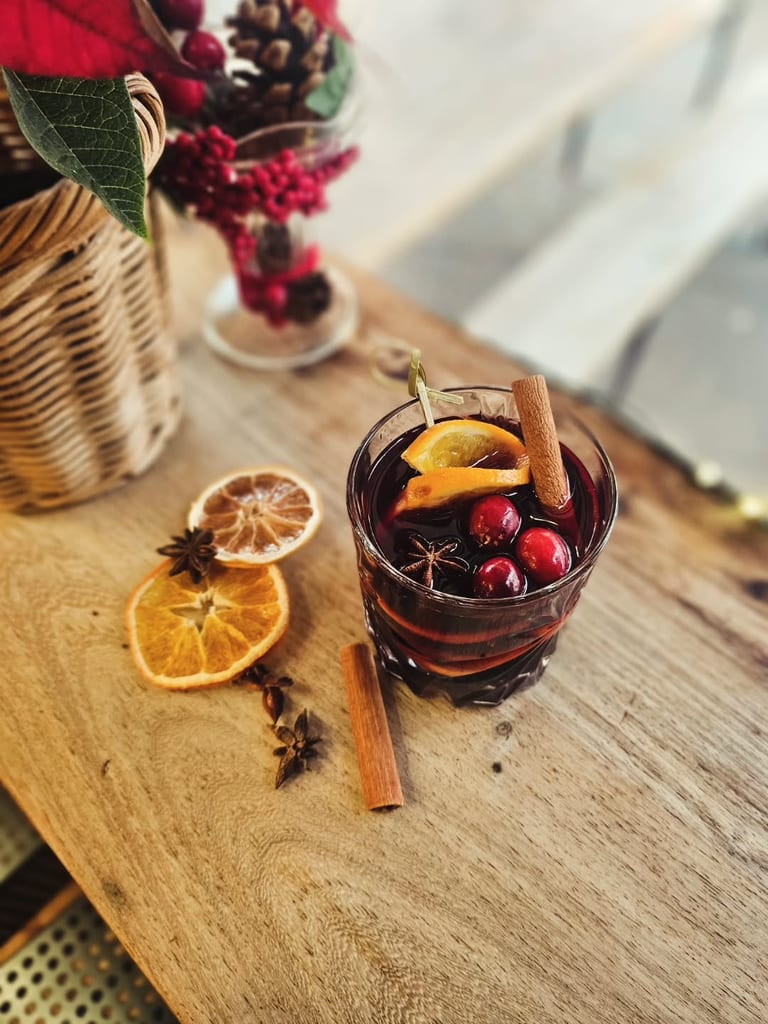 An aperitivo board with drinks and fresh fruit